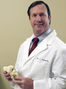 Dr. Lawrence Schrader